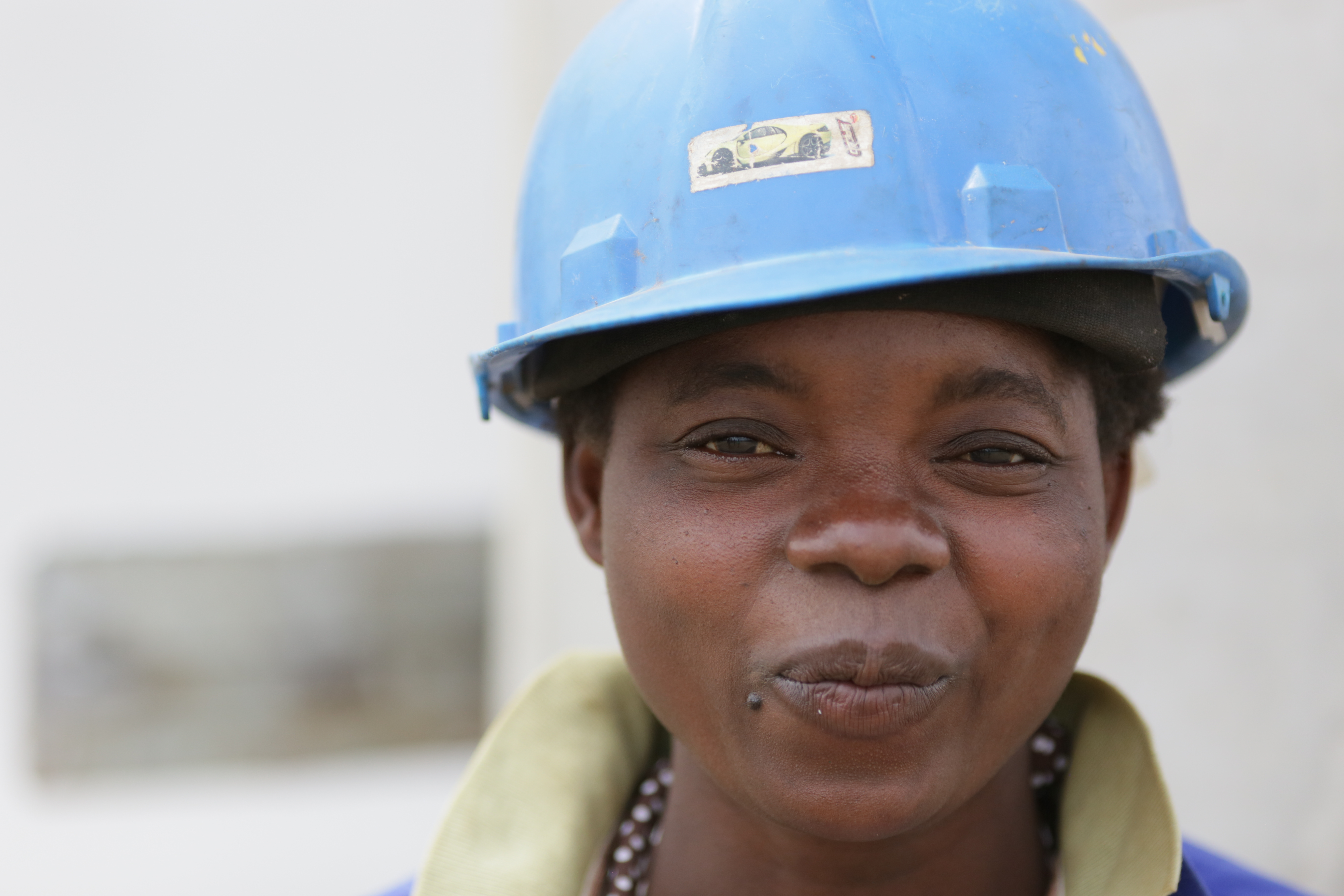 Photograph of a female utility worker