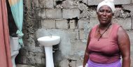 Thanks to an MCC-funded project in Cabo Verde that provided low-cost household connections to water and sanitation networks, Celestina has clean water coming directly to her home. She now spends less time collecting water and has a private, indoor toilet. Photo credit: MCA-Cabo Verde II