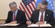 Kosovo President Hashim Thaçi, left, and MCC Acting CEO Jonathan Nash sign the Kosovo Threshold Program on September 12, 2017, in Washington, D.C. (Photo by Steve Ruark for MCC)