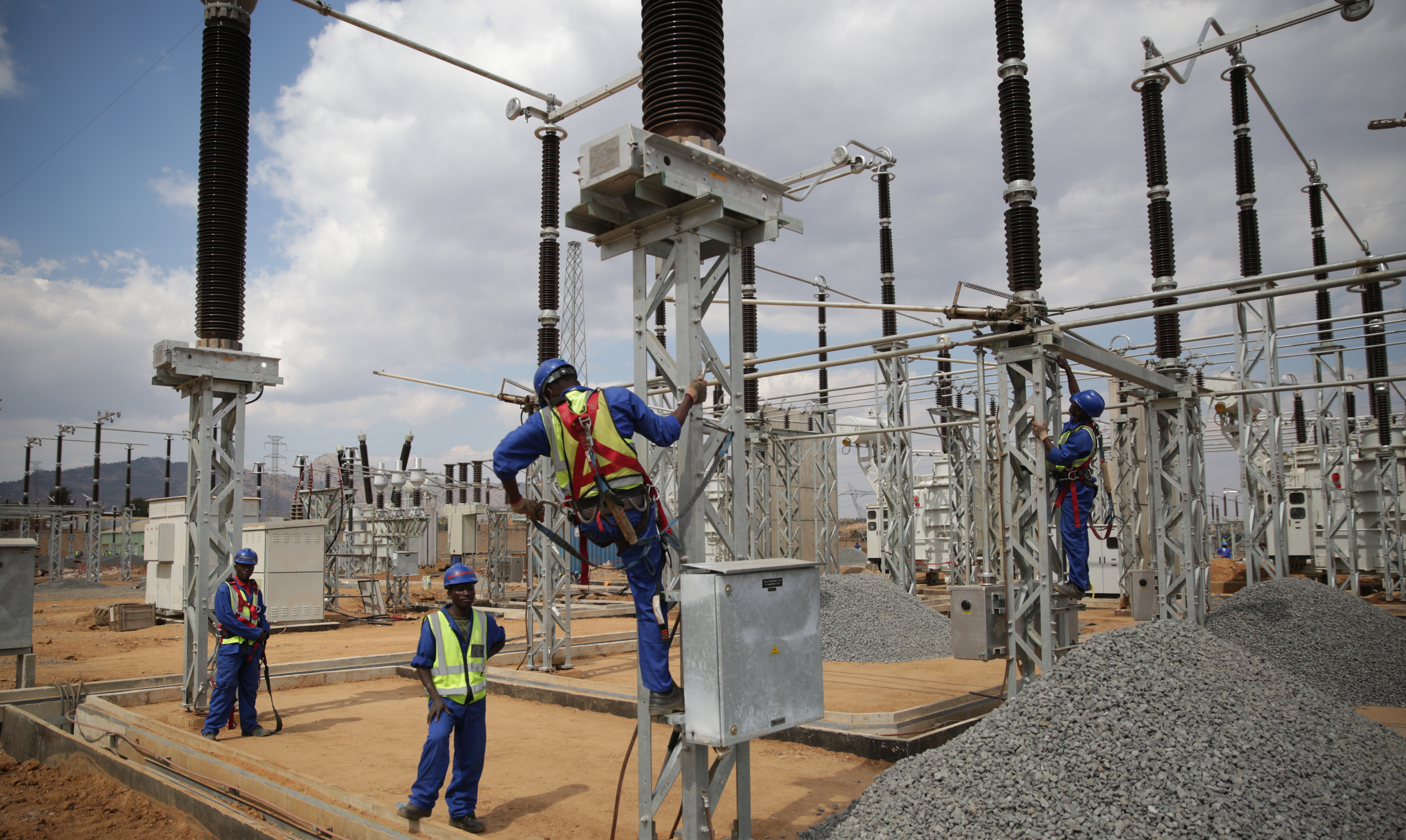 Workers at the 400-kv Nkhoma Substation in Malawi