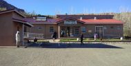 Patients and staff are seen outside of the St. Matthews Health Center in Quthing District, Lesotho.