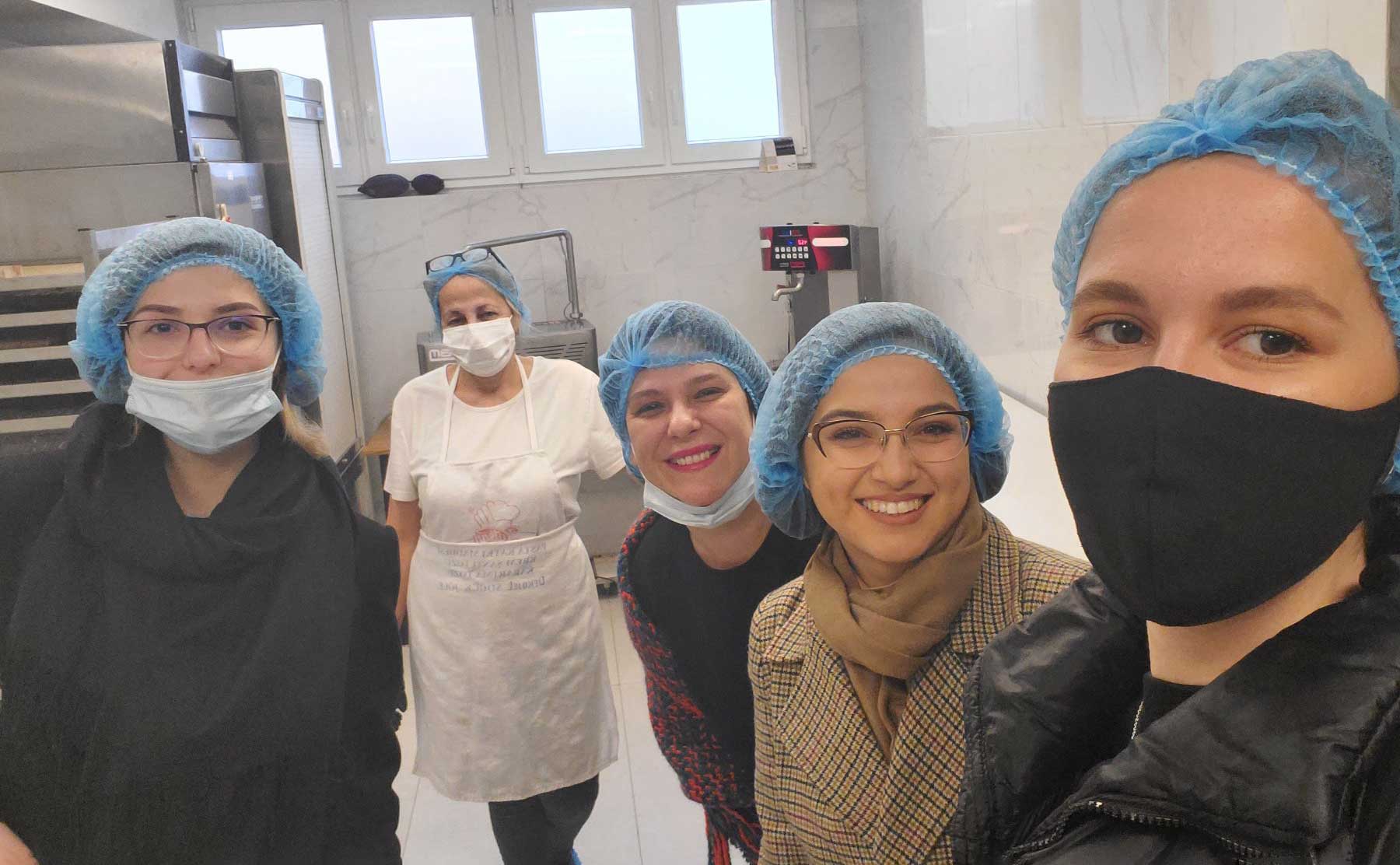 Chocolate Corner owner Bleta Zeqiri and her employees present the equipment and chocolates at their factory in Kosovo.