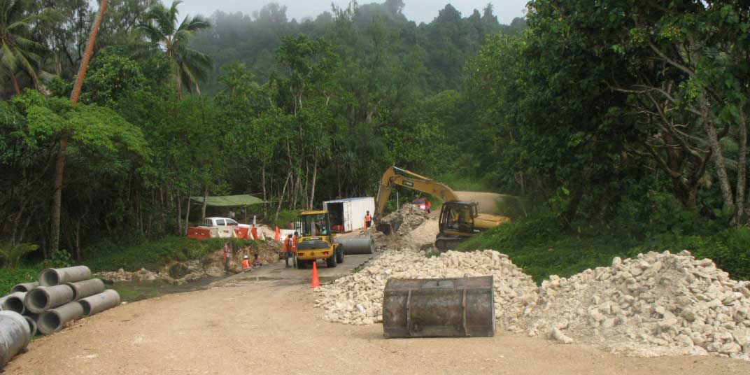 Photo of laying pavement.