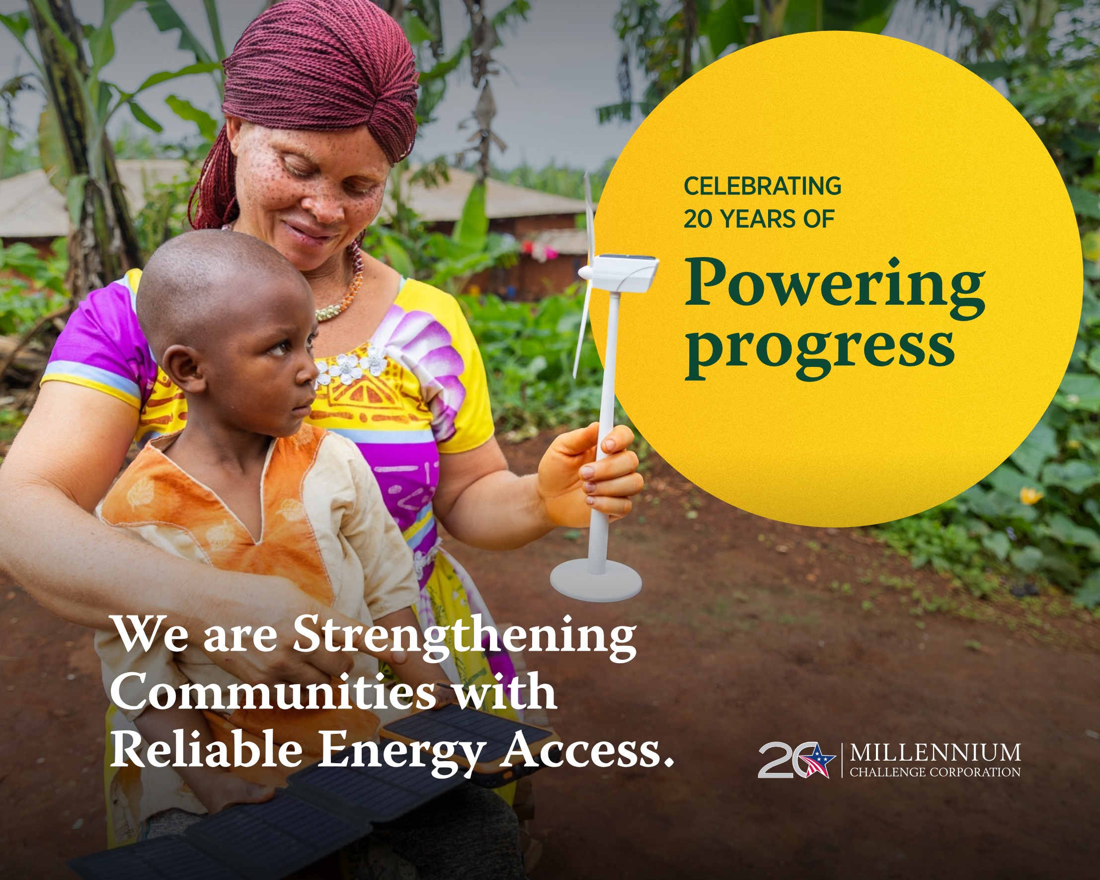 Woman and child holding mini solar panels with overlaid text: Celebrating 20 years of Powering Progress. We are strengthening communities with reliable energy access.