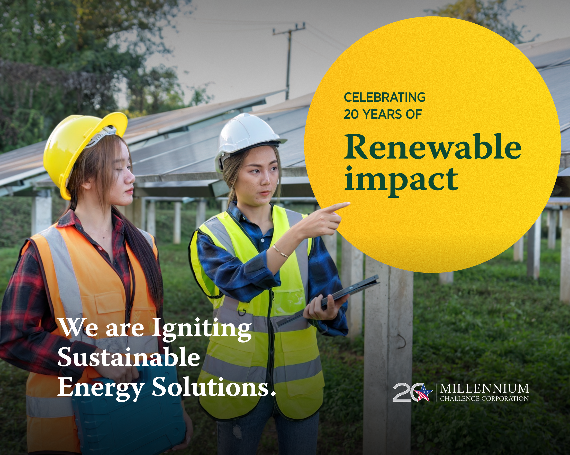 Two women walk through a solar array with overlaid text: Celebrating 20 years of Renewable Impact. We are igniting sustainable energy solutions.