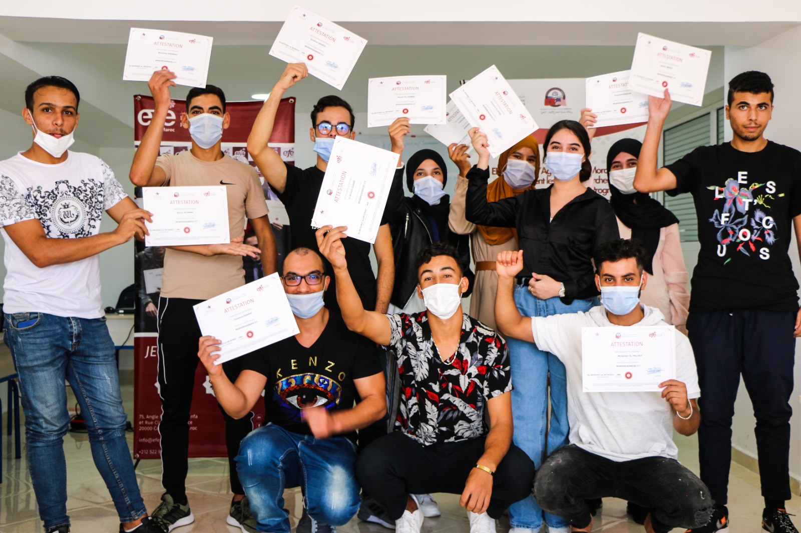 Trainees in Morocco celebrate receiving their work readiness certificates, their final preparatory step before starting new jobs.