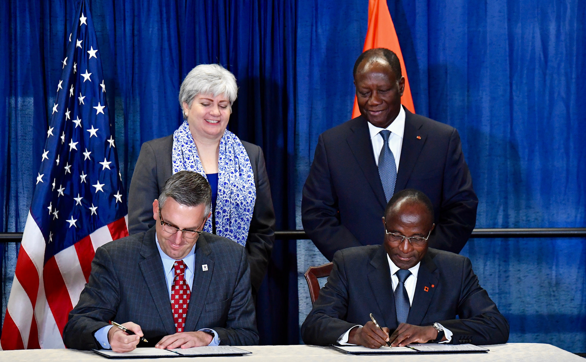 MCC Acting CEO Jonathan Nash, left, and Côte d’Ivoire Minister of Economy and Finance Adama Koné, right, sign the Côte d’Ivoire compact with Acting Principal Deputy Assistant Secretary of African Affairs Stephanie Sullivan and Côte d’Ivoire President Alassane Ouattara on Tuesday, Nov. 7, 2017, at the U.S. Department of State in Washington, D.C.