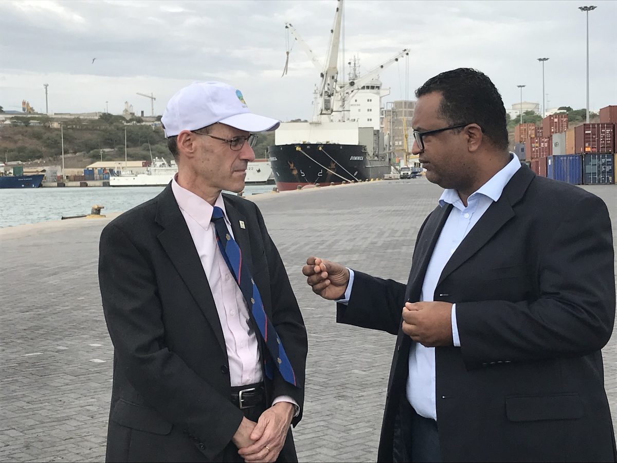 MCC Vice President for Compact Operations Robert Blau (left) and Port of Praia Administrator Celso Martins (right) discuss MCC’s 2005 investments that helped expand the port, maximizing its capacity and productivity in this island nation.