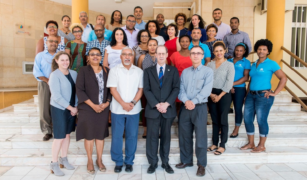 Millennium Challenge Account-Cabo Verde CEO Helder Santos (center, front row) and MCC Vice President for Compact Operations Robert Blau (right of Santos) outside of the MCA-Cabo Verde office with members of the MCC and MCA teams.