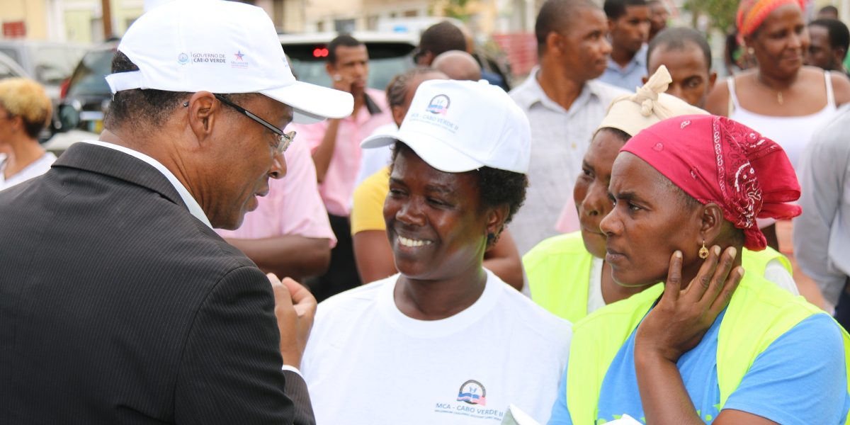 Cabo Verde Prime Minister José Ulisses de Pina Correia e Silva talks with attendees at a compact closeout celebration event in São Domingos.