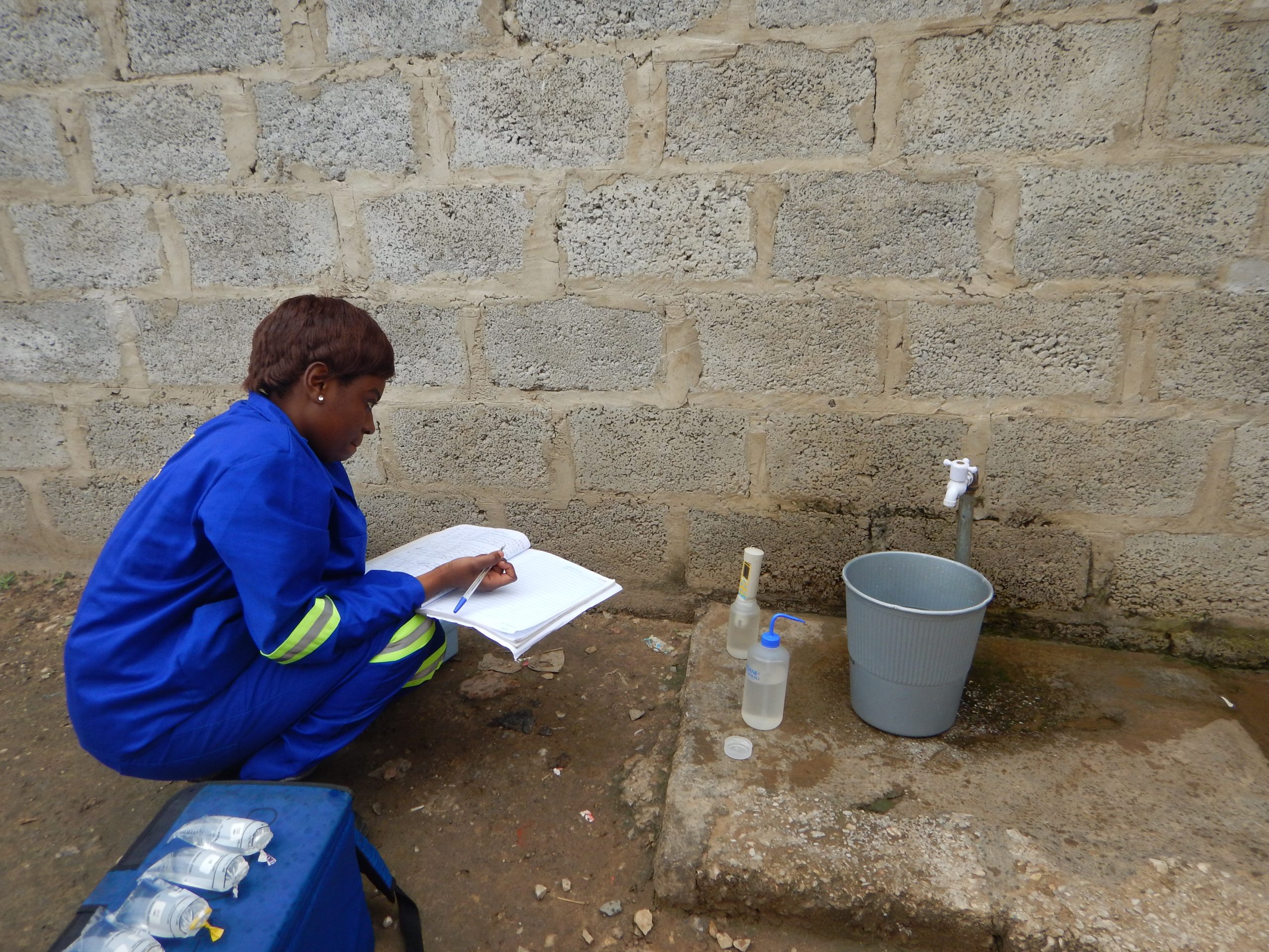 woman sampling drinking water