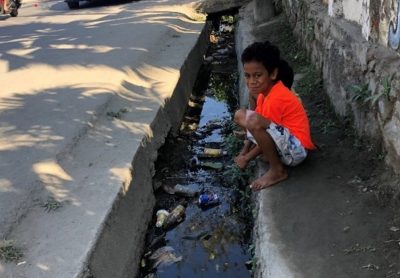 Boy on streets in Dili, Timor-Leste