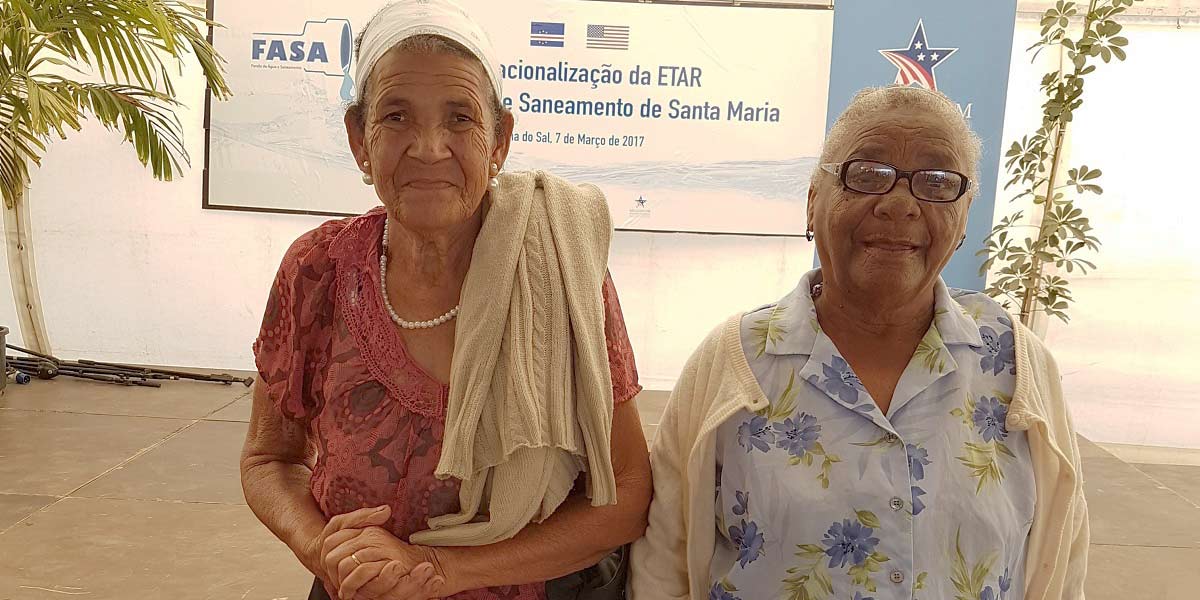 Maria Agusta Fortes (right) is a 77-year-old facilities operator who spends hundreds of dollars of her modest income each year to have the household septic tank emptied. The MCC-funded rehabilitation of the Santa Maria Wastewater Treatment Plant expands water and sanitation services to low-income residents like Fortes, who is looking forward to saving money and time by being connected to the town’s sewage system for the first time in her life. 